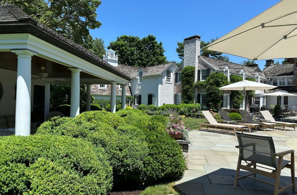 home with boxwoods