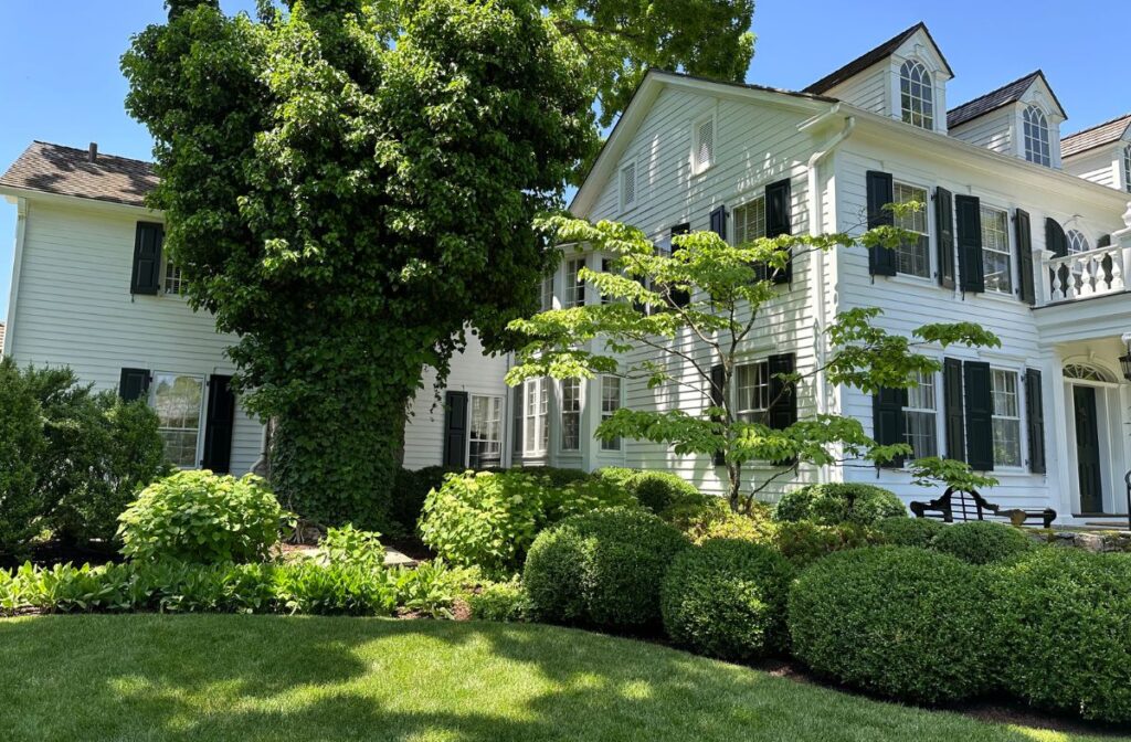 home with boxwoods
